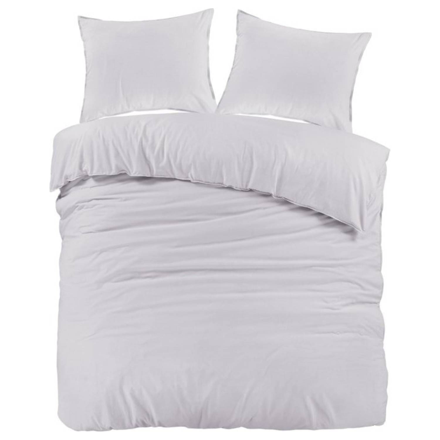 Wit dekbedovertrek met kussens op bed